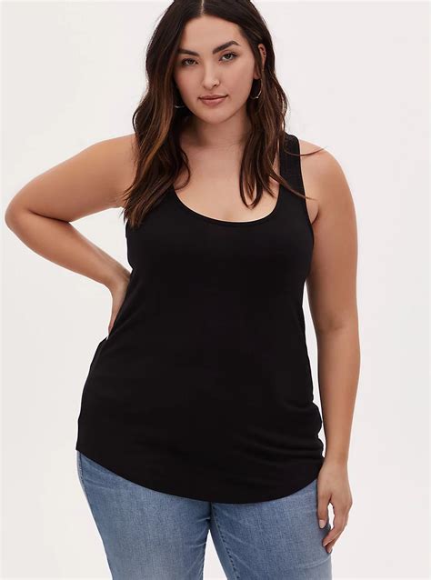 Model is 5&8217;9&8221;, size 1 Size 1 measures 29 14" from shoulder Polyester Wash cold,. . Torrid tank top